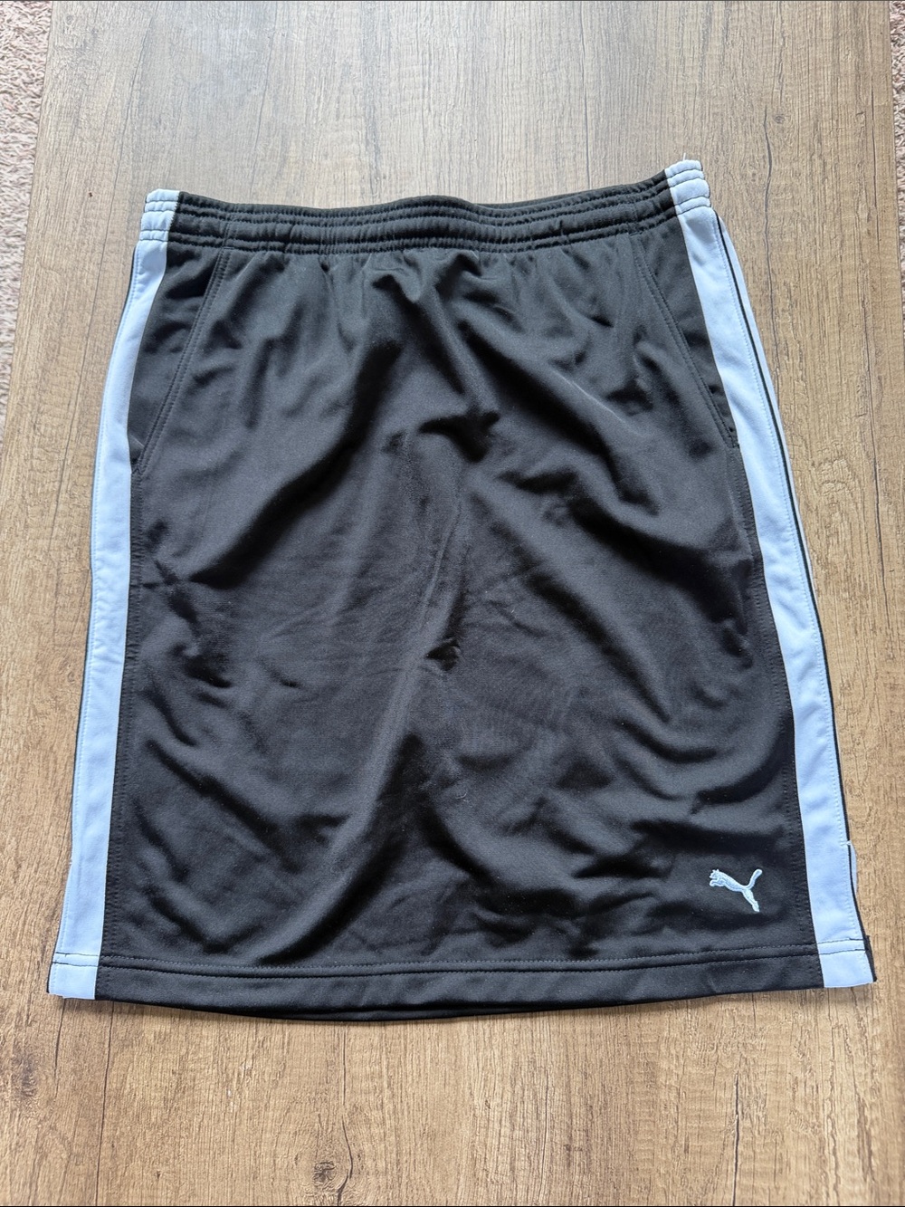 Puma Black Shirts with Light Blue Side Stripes